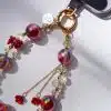 Scarlet Aurora Phone Charm - GALADO Malaysia