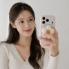 Puffy Flower Grip - Cream — in hand
