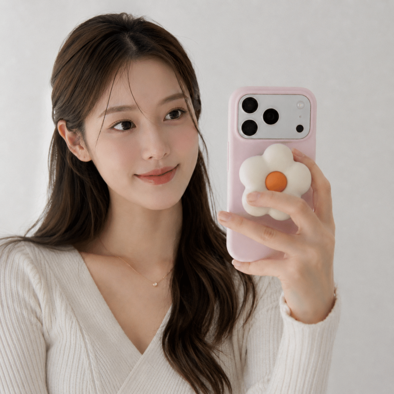 Puffy Flower Grip - Cream — in hand