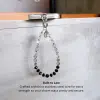 Mini Luxe (Midnight) Phone Charm — packaging view