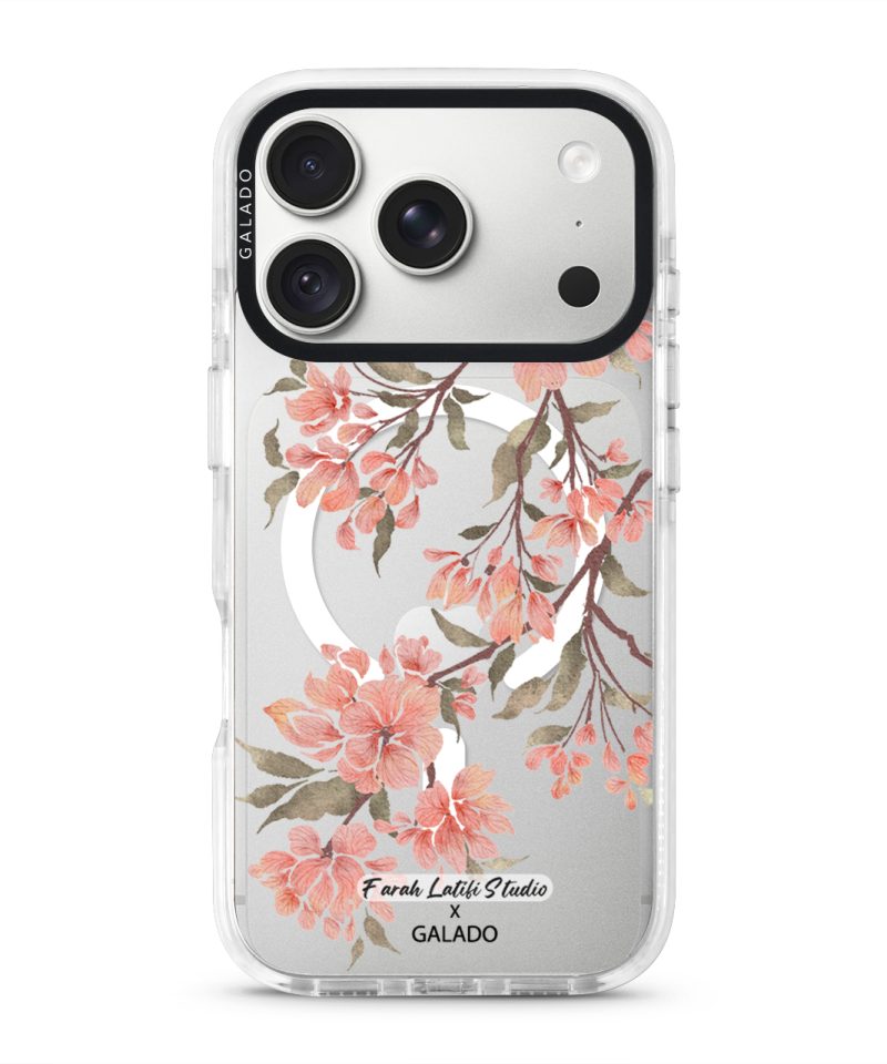 Sakura phone case by Farah Latifi Studio, pink cherry blossom branches on a clear case